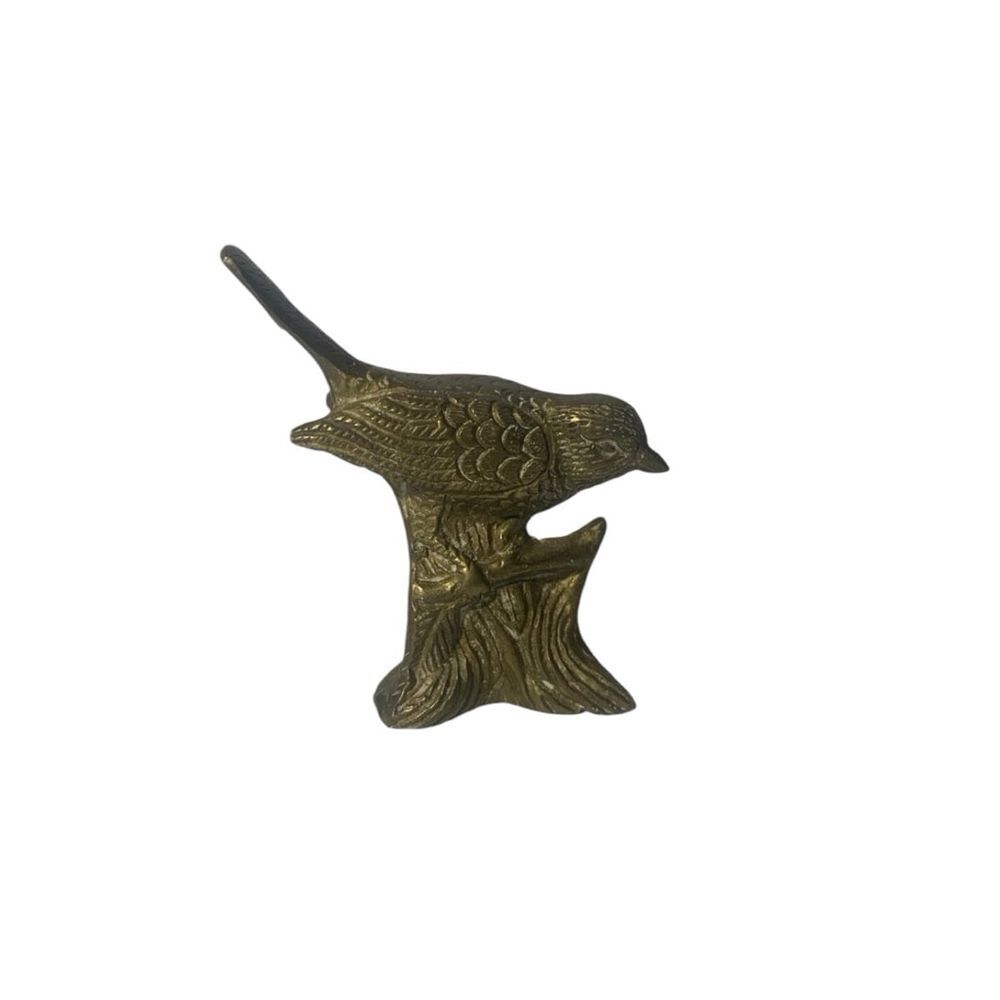 Vintage solid brass bird decor.